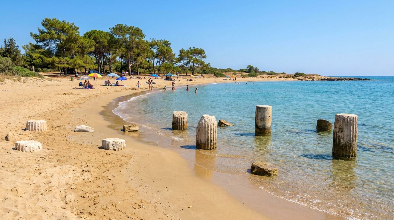 Sandy beach with ancient column fragments near Yeni Bogazici, North Cyprus